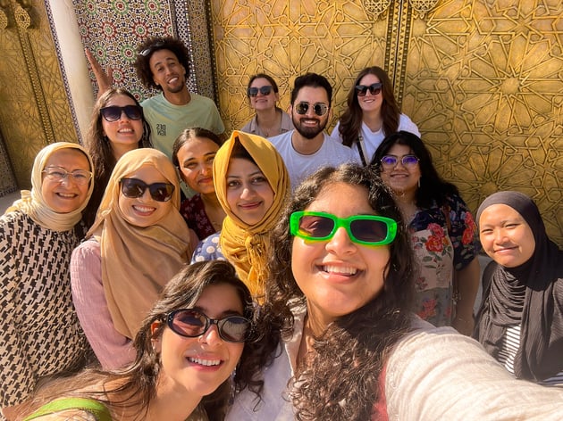A group of Travelers together in Morocco, which is one of the best and least crowded places to visit in May.
