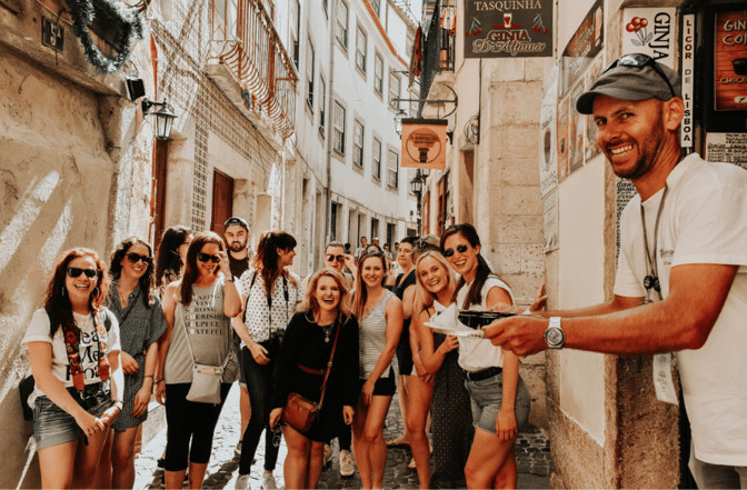 TrovaTrip Host Helene Sula and Travelers on tuktuk tour in Lisbon.