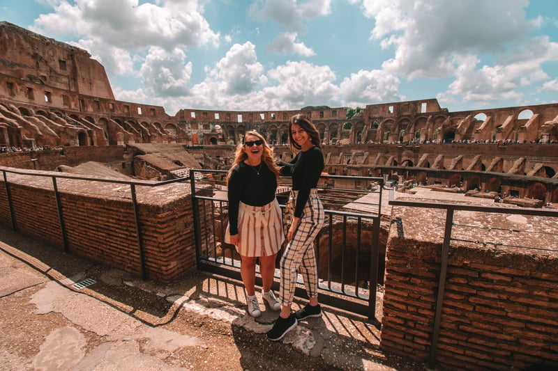 TrovaTrip Host Helene Sula and Traveler at Colosseum in Rome, Italy.