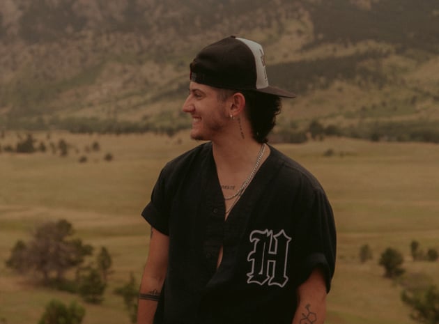 Sam Avery, a Trova Host who is uplifting trans voices through queer group travel.