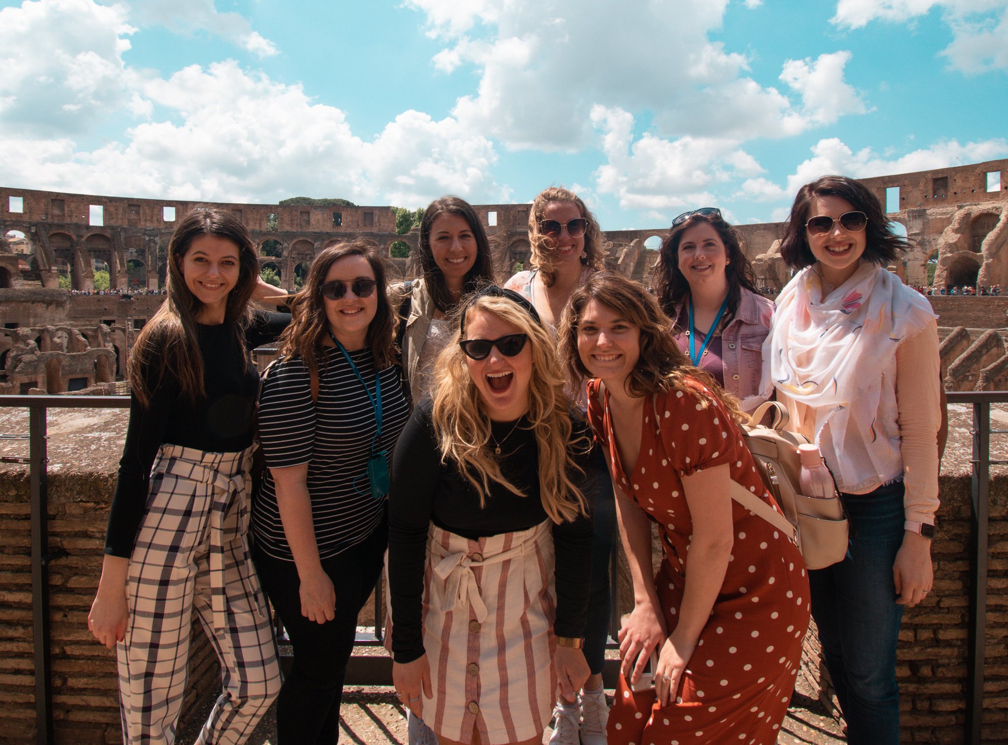 TrovaTrip group of travelers smiling at camera in Rome