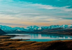 TrovaTrip New Zealand view of mountains with lake in front
