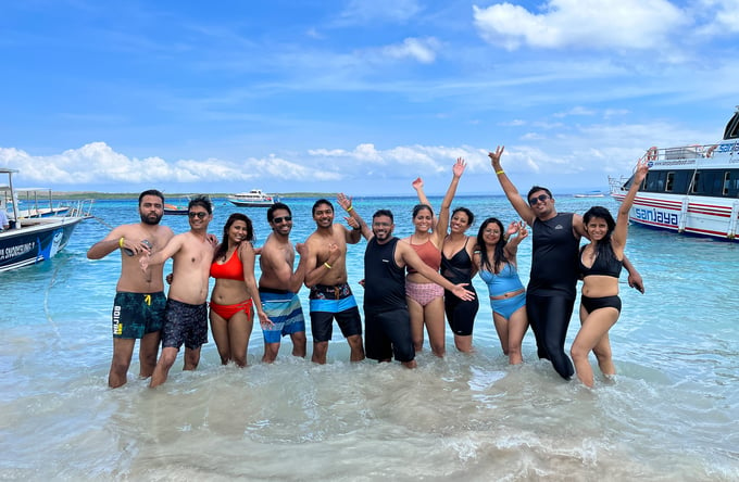 TrovaTrip Host @kritika_goel and Travelers at the beach, Bali 2022.