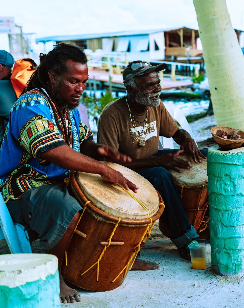 Locals playing drums in Belize.