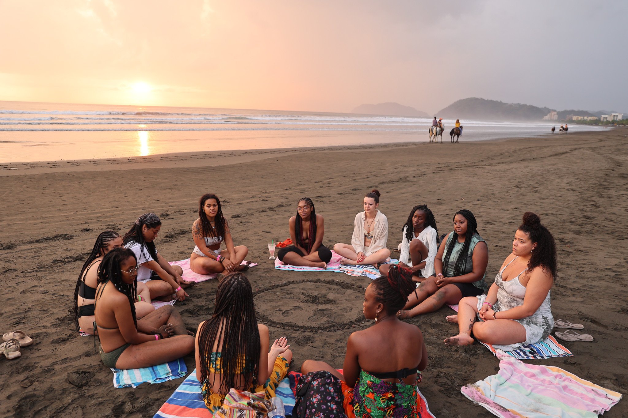 TrovaTrip Host @veladyaorganica leading a meditation circle on the beaches of Costa Rica.