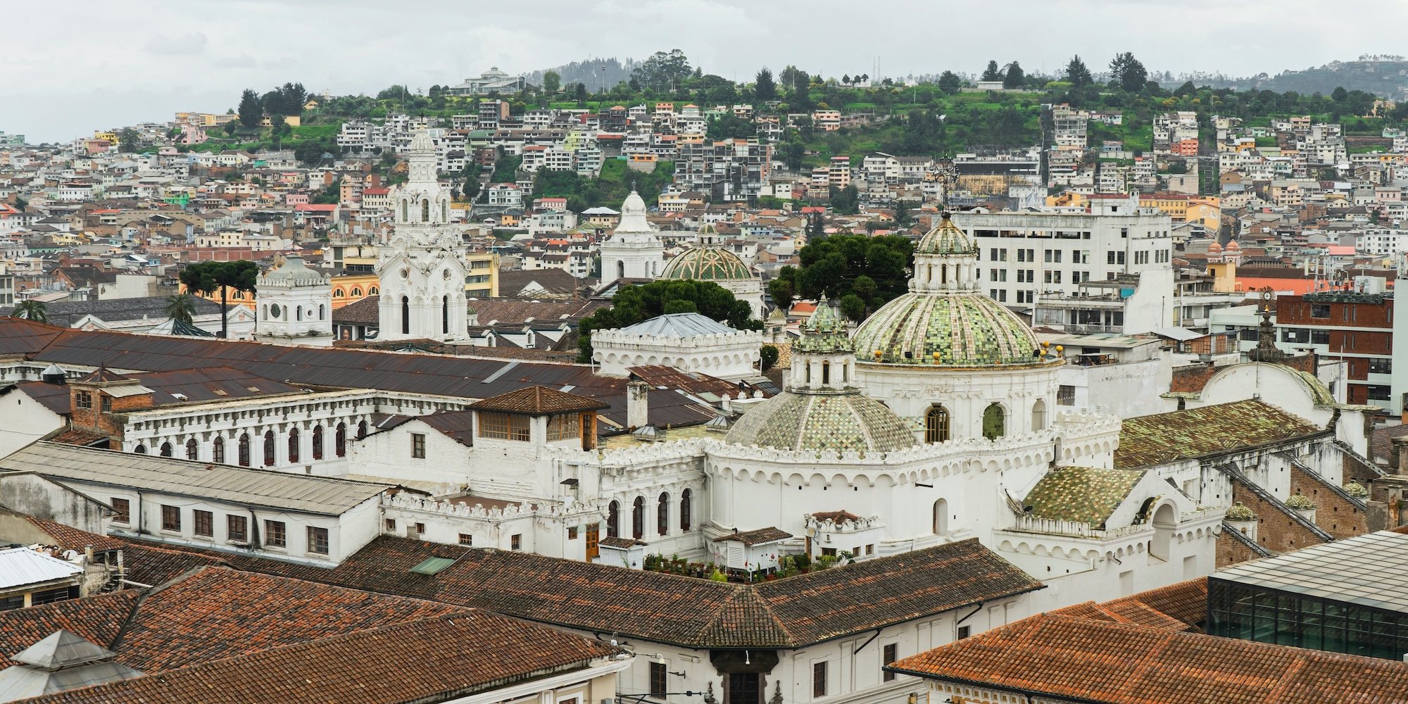 A skyline view of rooftops in Quito, Ecuador.