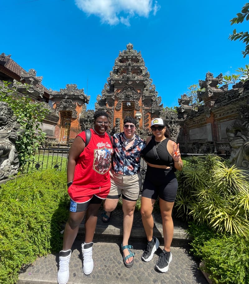 TrovaTrip Travelers standing in front of a temple in Bali.