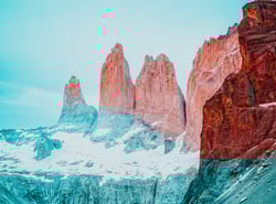 TrovaTrip Patagonia red mountains against blue sky