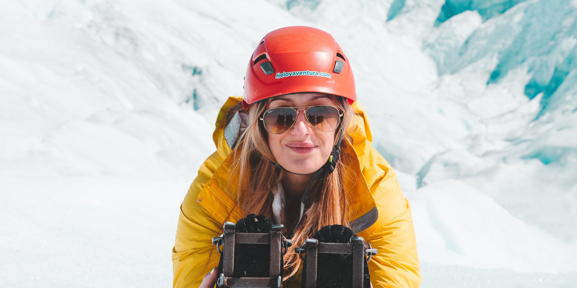 Woman stretching in snow in Patagonia.