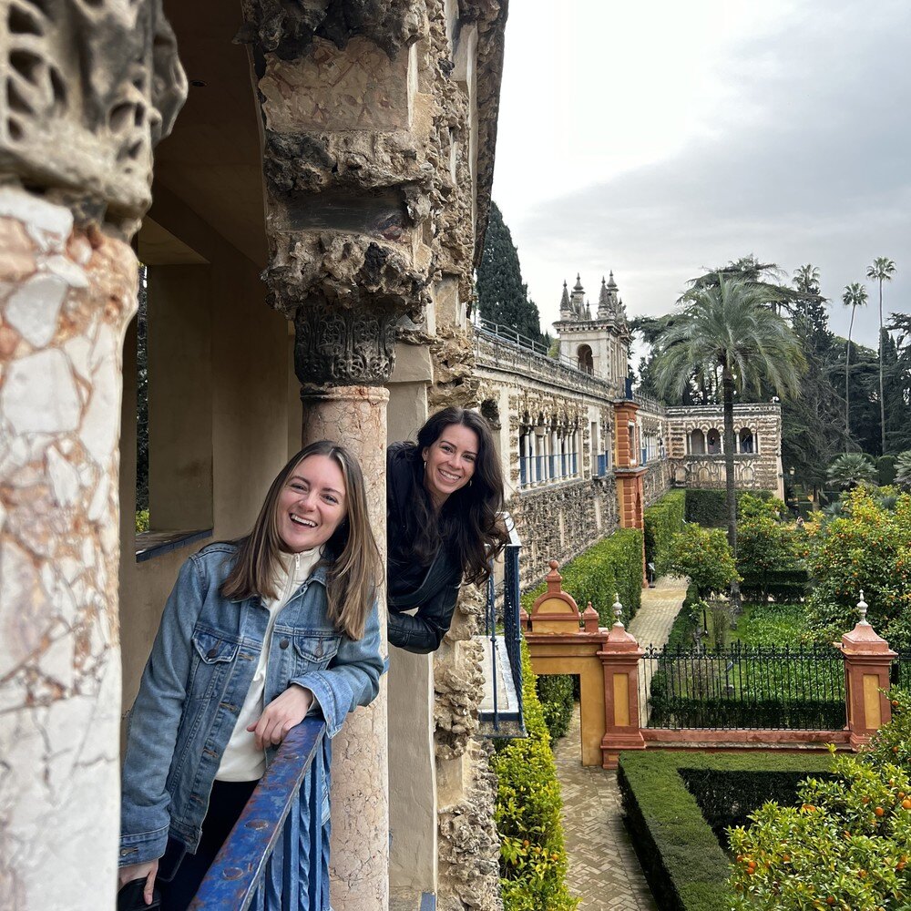 Two friends in Spain, the best destination to visit in September.