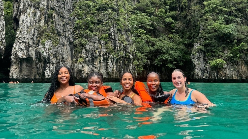 TrovaTrip group swimming in Thailand, one of the best places to travel in 2026.