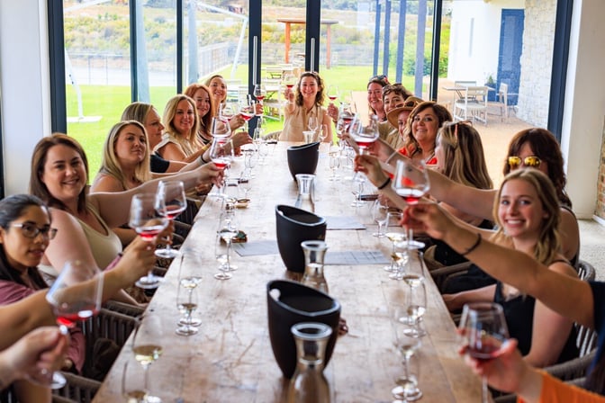 Travel Content Creator Lindsay Mukaddam onegirlwandering on a group trip wine tasting with her Travelers.