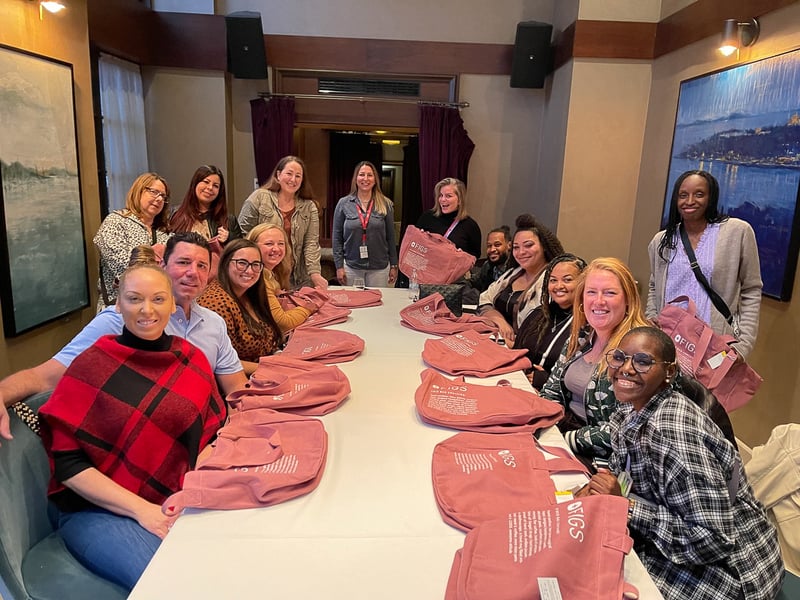 A group of Travelers with Host @thekatieduke and gift bags.