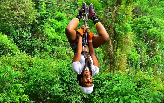 Person ziplining during a retreat in Costa Rica.