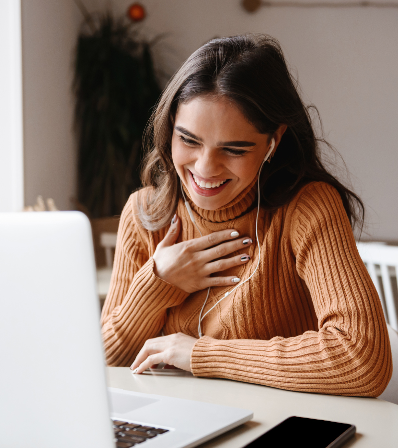 A person on a video chat on their laptop.