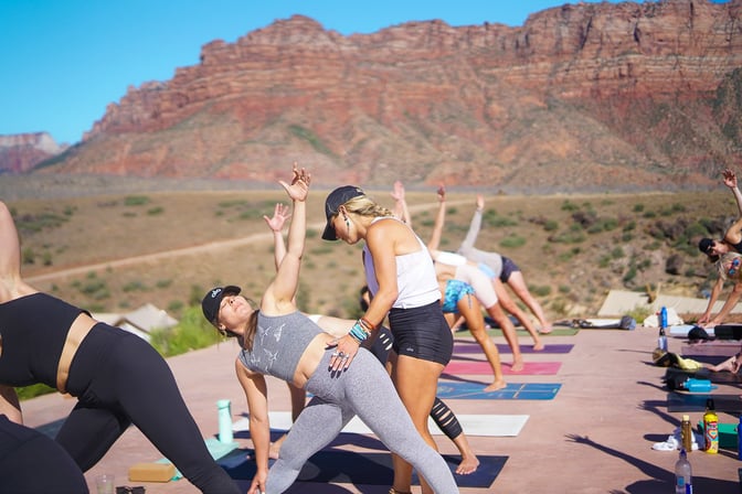 Yoga teacher leading a retreat in Zion, Utah.