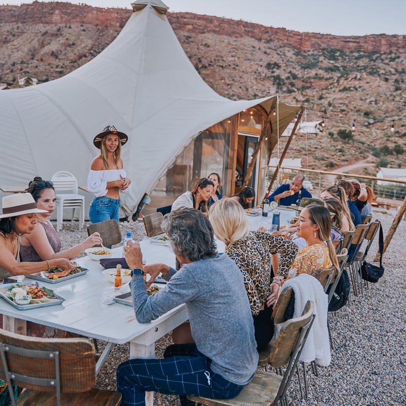 TrovaTrip Host @miamiyogagirl leading group dinner in Zion.