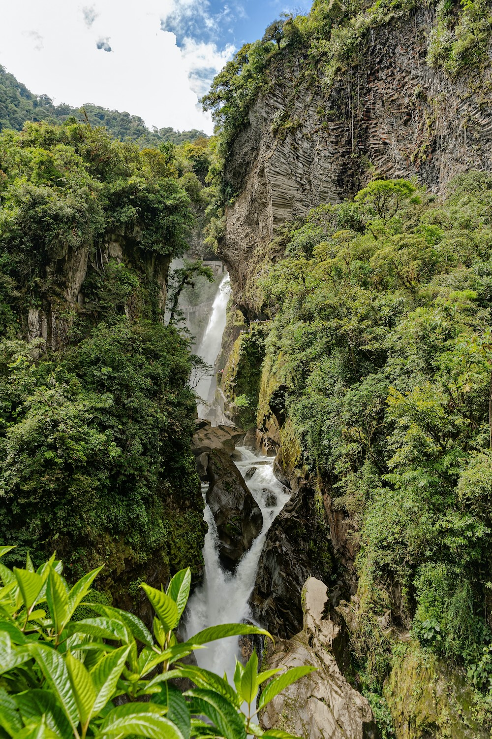 A waterfall in the Amazon rainforest of Baños de Agua Santa.